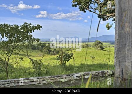 Australian Farmland during summer in Queensland and hills in the background Stock Photo