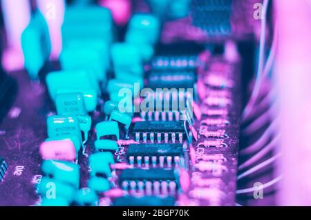 Vintage electronic circuit boards with radio parts and chips, close-up, macro photo Stock Photo