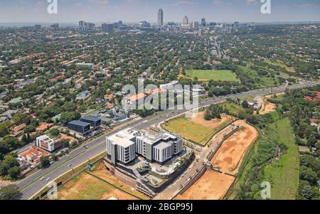 Aerial photo of Sandton Gate with Sandton CBD in the background Stock Photo