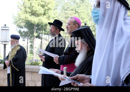 Jerusalem, Israel. 22nd Apr, 2020. Jewish, Christian, Muslim and Druze religious leaders holding an interfaith prayer for the victims and protection from COVID-19 coronavirus pandemic in Jerusalem, Israel. Stock Photo