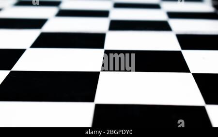 Isolated black and white colored chess board with no chess pawns placed on top of it Stock Photo