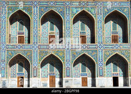 Tilya Kori Madrasah facade showing pishtaq and spandrel with the ornament details in the Registan, Samarkand, Uzbekistan. Islamic architecture. Stock Photo