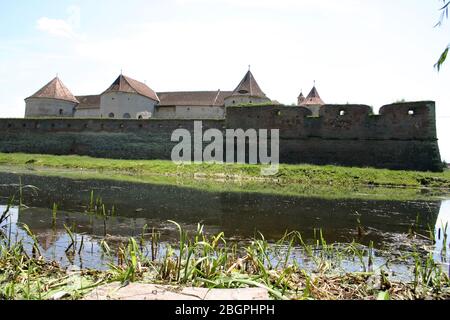 The 16th century Făgăraș Citadel, Romania, and the moat around it Stock Photo