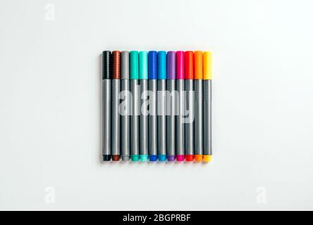 Set of multicolor felt pens, markers on white background, colorful fineliners. Stock Photo
