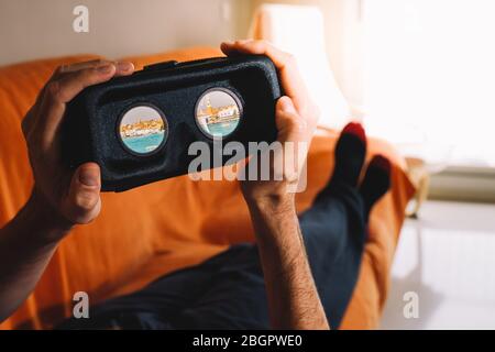 Man using VR headset and doing Virtual reality travel Stock Photo