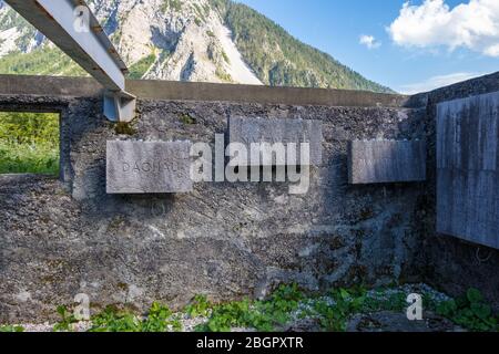 Ljubelj, Slovenia - August 09, 2019: Remains of Camp Loibl in Slovenia. Memorial Plaques with names of Concentration Camps. Memorial park Mauthausen Stock Photo