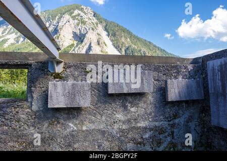 Ljubelj, Slovenia - August 09, 2019: Remains of Camp Loibl in Slovenia. Memorial Plaques with names of Concentration Camps. Memorial park Mauthausen Stock Photo