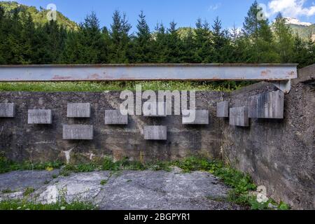 Ljubelj, Slovenia - August 09, 2019: Remains of Camp Loibl in Slovenia. Memorial Plaques with names of Concentration Camps. Memorial park Mauthausen Stock Photo