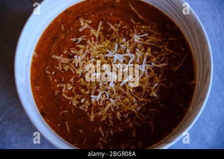 Homemade tomato soup with parmesan cheese Stock Photo