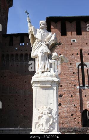 Milan, Italy- 20 September 2019:  baroque statue of St John of Nepomuk  protector of soldiers, stands in the courtyard of the historic citadel Sforza Stock Photo