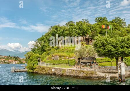 Shipping Pier of Isola Comacina at Lake Como seen from the lakeside, Lombardy, Italy Stock Photo