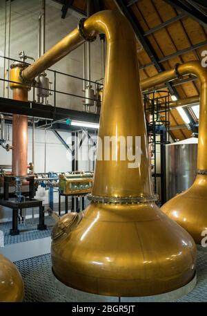 Copper pot whisky spirit still at Arran Whisky Distillery, one of the famous Scottish distilleries, at Lochranza, Isle of Arran, Scotland Stock Photo