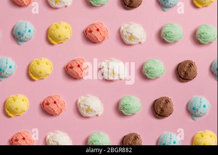 Seamless pattern of balls of natural colorful ice cream on a pink background Stock Photo