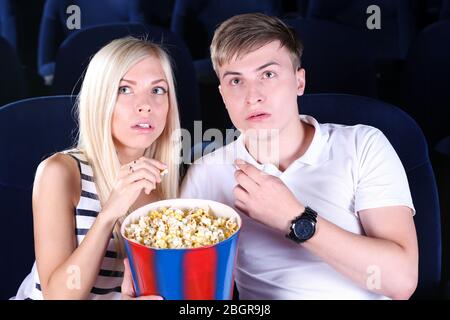 Young couple watching movie in cinema Stock Photo