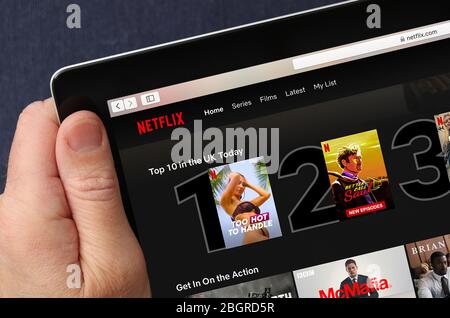 Watching Netflix on an iPad Stock Photo