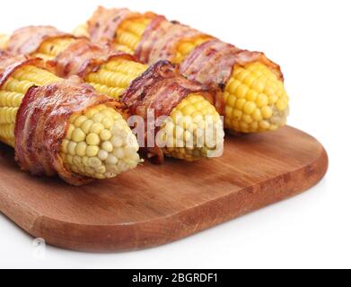 Grilled bacon wrapped corn, isolated on white Stock Photo