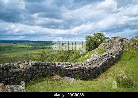 Hadrian's Wall, blockstone construction boundary in Northumberland National Park at Walltown Crags, England Stock Photo