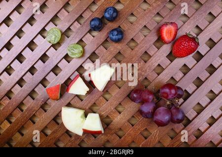 Chopped Fruits Arranged On Cutting Board Stock Photo 1099344800