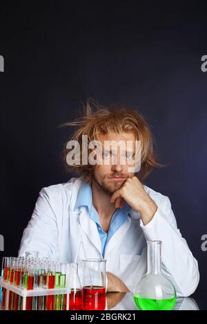 Crazy scientist working in laboratory Stock Photo