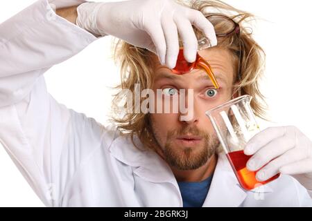 Crazy scientist working in laboratory Stock Photo