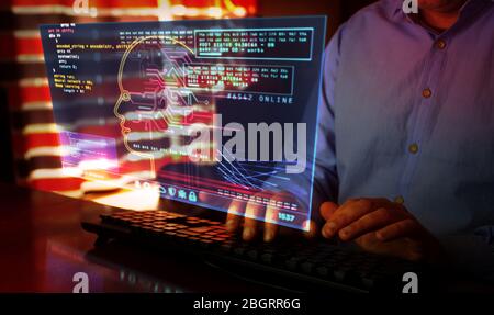 Artificial intelligence. Camera moves around hud display and man typing keyboard. Deep machine learning technology with cyber head shape. Digital AI f Stock Photo