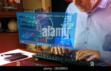 Artificial intelligence. Camera moves around hud display and man typing keyboard. Deep machine learning technology with cyber head shape. Digital AI f Stock Photo