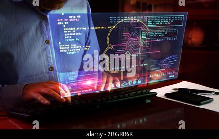 Artificial intelligence. Camera moves around hud display and man typing keyboard. Deep machine learning technology with cyber head shape. Digital AI f Stock Photo