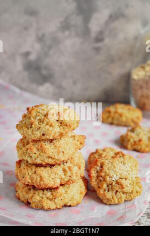 Oatmeal cookies on a light background. A stack of oatmeal cookies. Homemade healthy pastries. Stock Photo