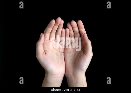 Two hands with palms up Stock Photo - Alamy