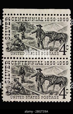 United States Postage Stamps - SILVER CENTENNIAL 1859 - 1959. Issued to commemorate the 100th anniversary of the Comstock Lode in Nevada. Mining Stock Photo