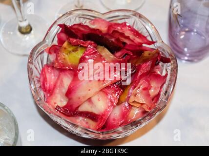 Cabbage leaf salad with beetroot. The salad is in a plate on the table. Stock Photo