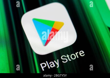 Burgos, Spain - April 13, 2020: Play store application icon on smartphone screen. Mobile application icon of play store. Google Play Store .  Stock Photo