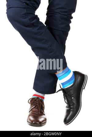 Man leg in suit and colorful socks, isolated on white Stock Photo