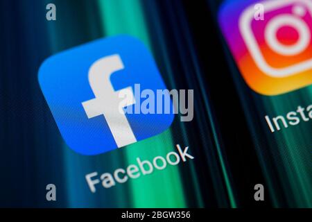 Burgos, Spain - April 13, 2020: Macro photography of social media app icons of Facebook and instagram on mobile screen . Stock Photo