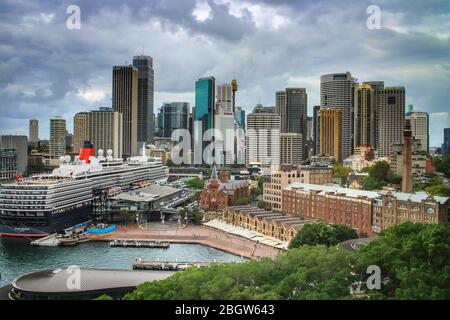 Skyline of Sydney's Central Business District with Circular Quay of Sydney harbor as seen from Harbor Bridge. Sydney, New South Wales, Australia. Stock Photo