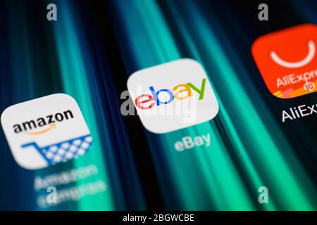 Burgos, Spain - April 13, 2020: Global e-commerce applications icons on smartphone screen close-up. Mobile application icon of Amazon, Ebay, Aliexpress . Stock Photo