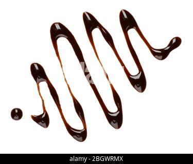 Chocolate syrup drips isolated on white Stock Photo