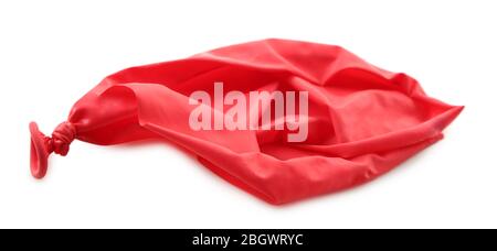 Popped red balloon isolated on white Stock Photo