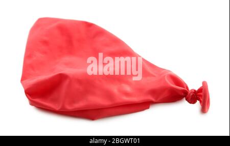 Popped red balloon isolated on white Stock Photo