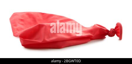 Popped red balloon isolated on white Stock Photo
