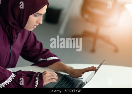 professional young female muslim worker having problem Stock Photo