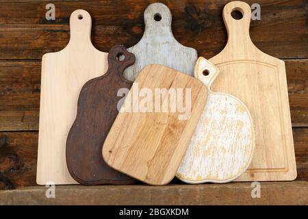 Empty cutting boards on wooden background Stock Photo