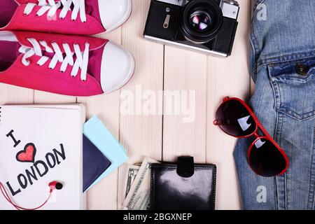 Travel things for traveling on wooden background top view Stock Photo