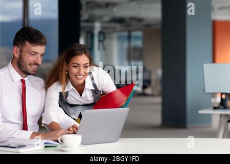 Young Business people working together on computer Stock Photo