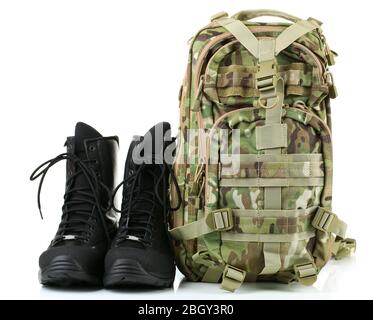 Black army boots and backpack, isolated on white Stock Photo