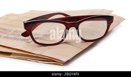 Glasses and newspapers, isolated on white Stock Photo