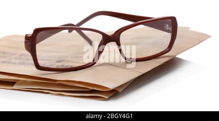 Glasses and newspapers, isolated on white Stock Photo
