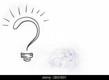 Question mark on sheet of paper,  on white background Stock Photo
