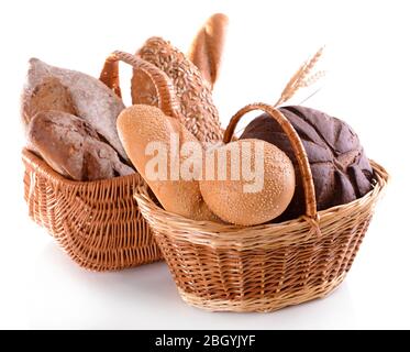 Different bread in wicker baskets isolated on white Stock Photo
