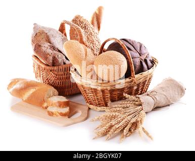 Different bread in wicker baskets isolated on white Stock Photo